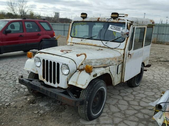 1976 White Jeep Hard Top front left view