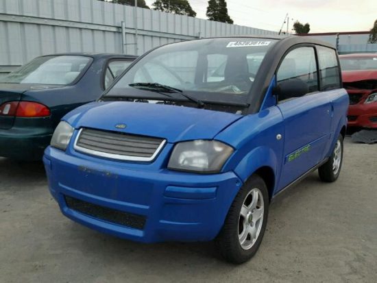 2008 Blue Zenn Electric Car front left view