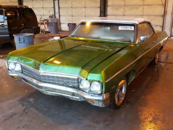 Outside front right side of car view - 1970 Green Chevy Impala donated to Kars For Kids
