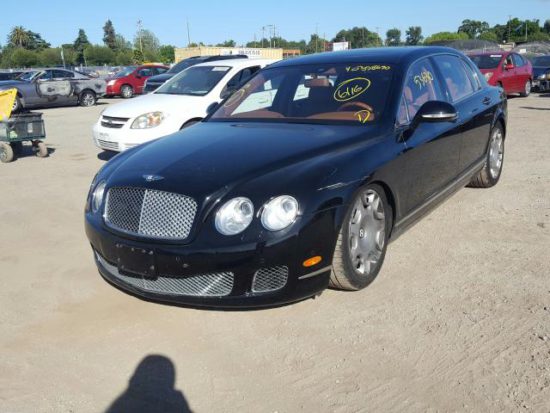 front left 2010 black Bentley Continental Flying Spur - front left view