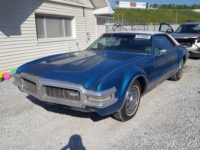 1968 Teal Oldsmobile Toronado front left view