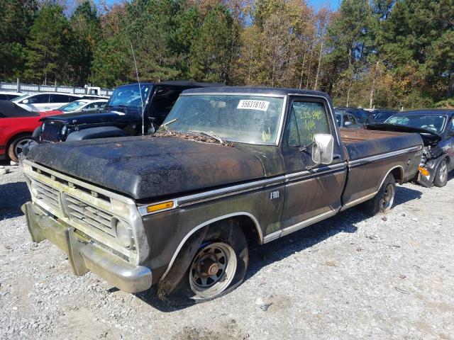 1975 Black Ford F-100 front left view