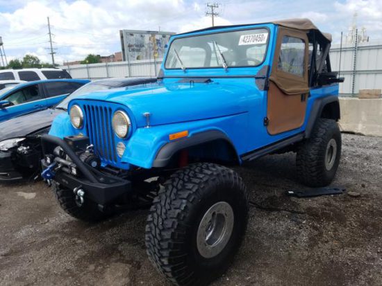 1977 Bright Blue Jeep CJ-7 - front left view