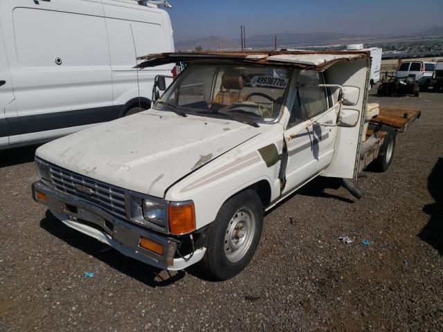 1984 White Toyota Hilux Half-Ton Pickup front left view