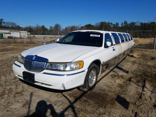 1999 White Lincoln Town Car E front left view