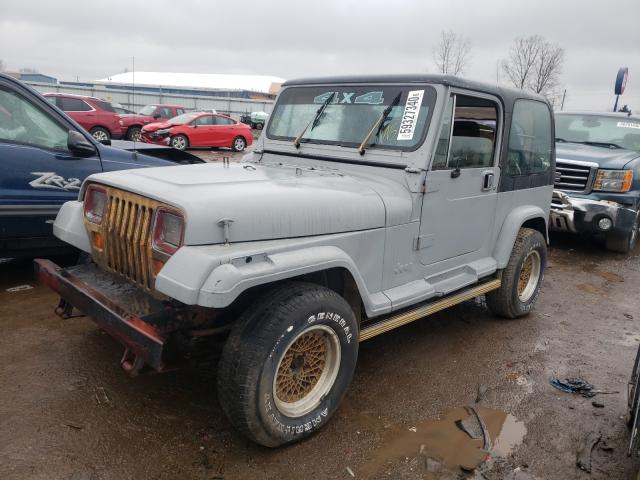 1987 Gray Jeep Wrangler - front left view