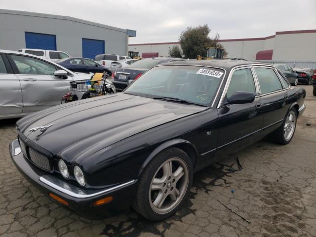 1999 Black Jaguar XJ8 front left view