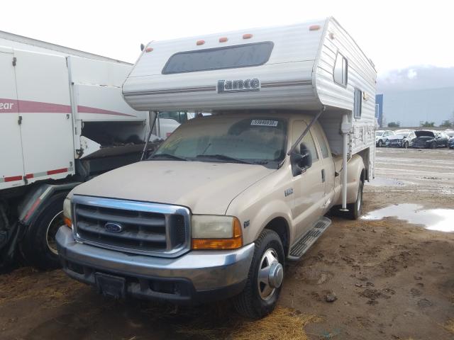 1999 Light Prairie Tan Metallic Ford F-350 Super Duty front left view