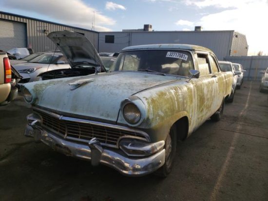 1956 Blue Ford Fairlane - front left view