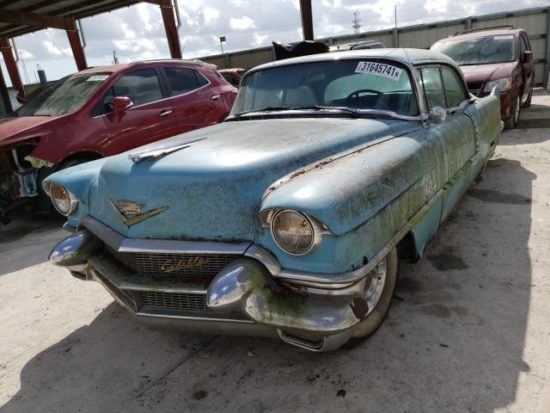 1956 Blue Cadillac Sedan DeVille (two-tone Aquamarine Blue/Alpine White) - front left view