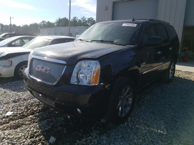 2012 Black GMC Yukon Denali - front left view